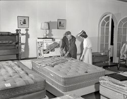 July 1941. "Detroit, Michigan. Selling mattresses at the Crowley-Milner department store." More like deFARKment store. Medium-format nitrate negative by Arthur Siegel for the Office of War Information. View full size.