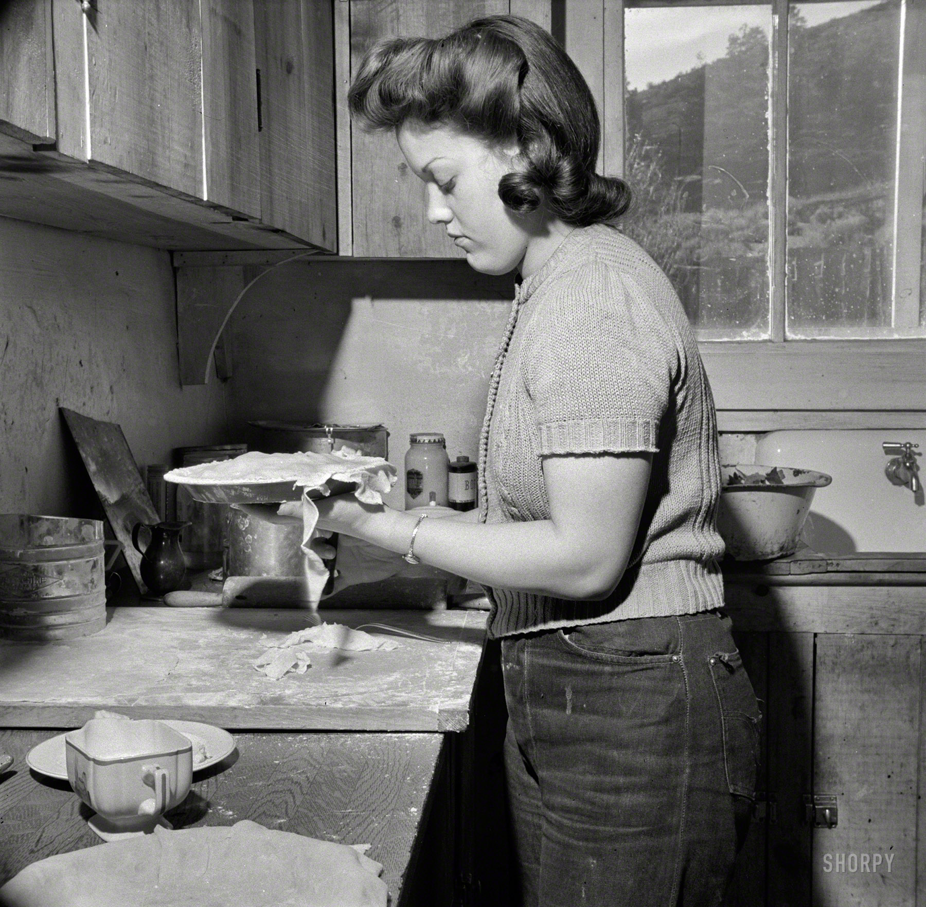 February 1943. "Moreno Valley, New Mexico. Mary Mutz making an apple pie on the Mutz ranch." John Collier for the Office of War Information. View full size.