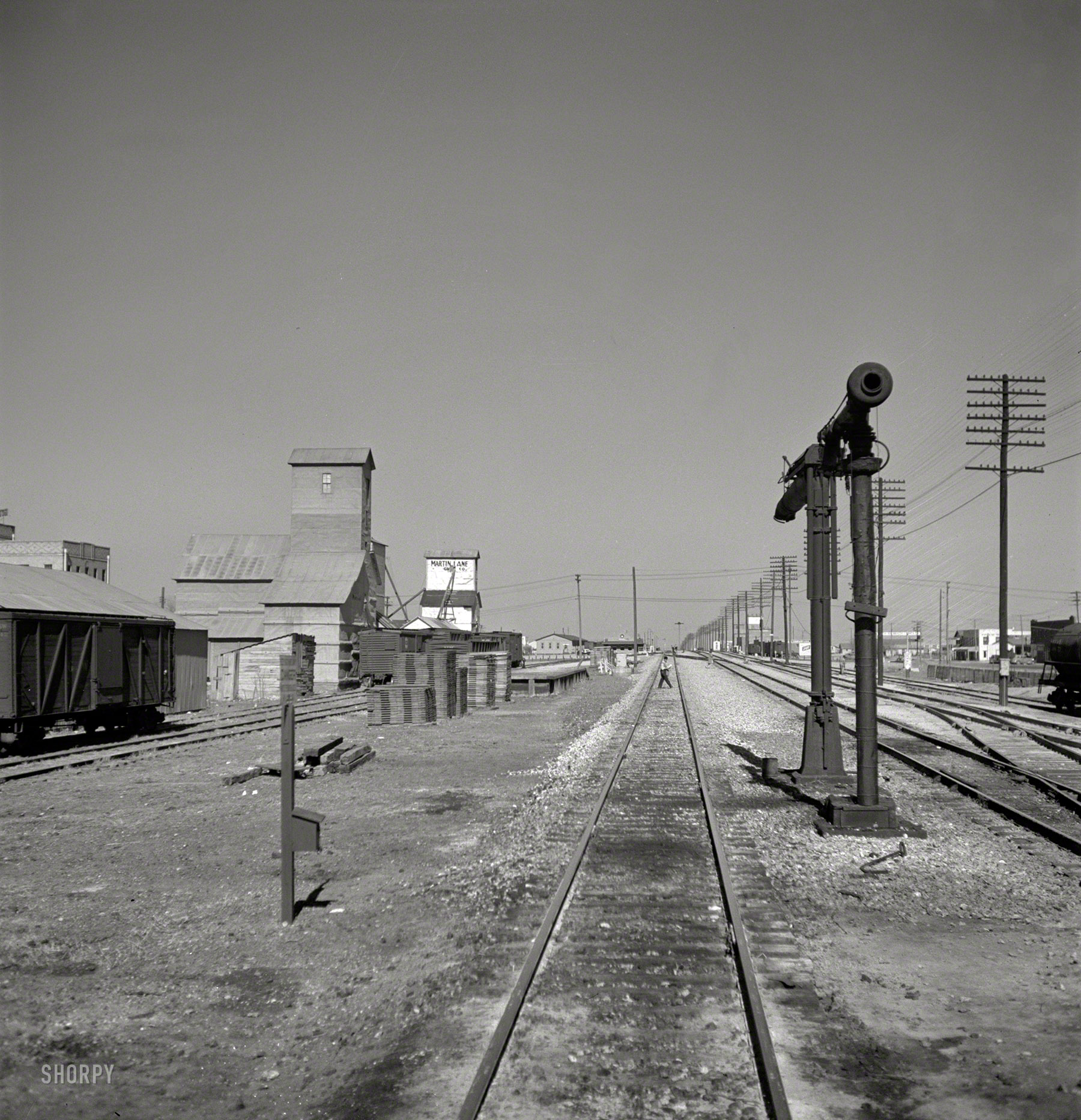 March 1943. "Pampa, Texas. Going through a town on the Atchison, Topeka & Santa Fe." Photo by Jack Delano, Office of War Information. View full size.