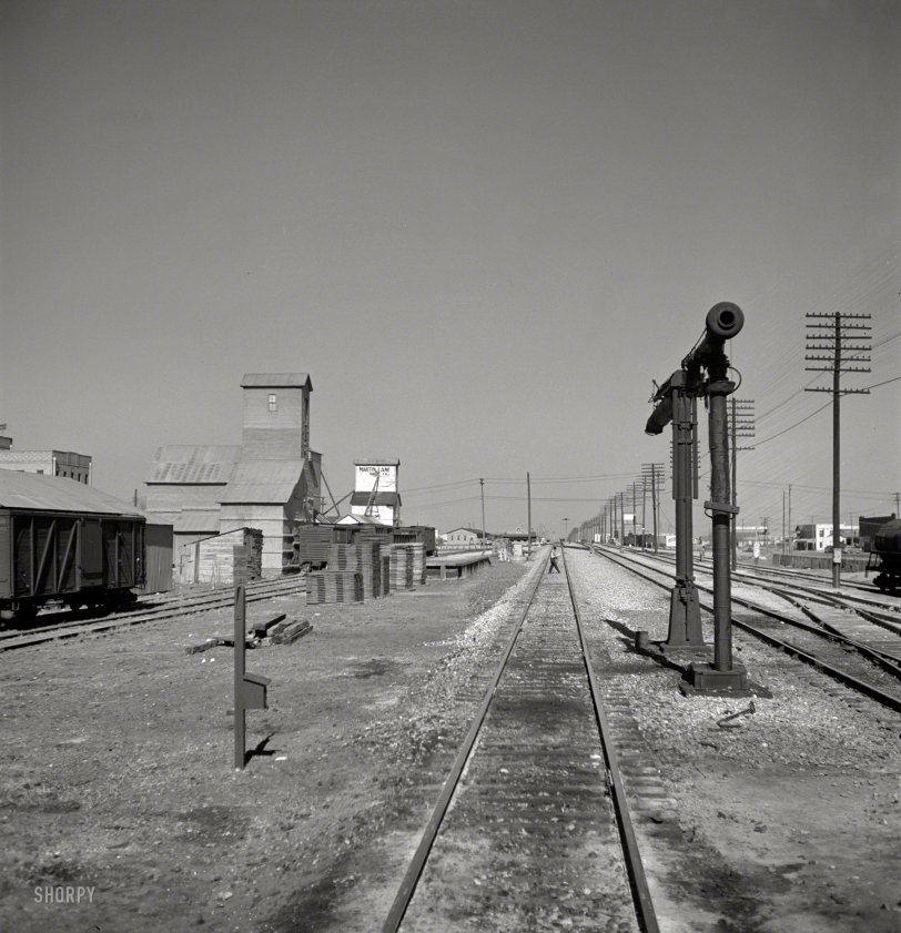 March 1943. "Pampa, Texas. Going through a town on the Atchison, Topeka &amp; Santa Fe." Photo by Jack Delano, Office of War Information. View full size.
