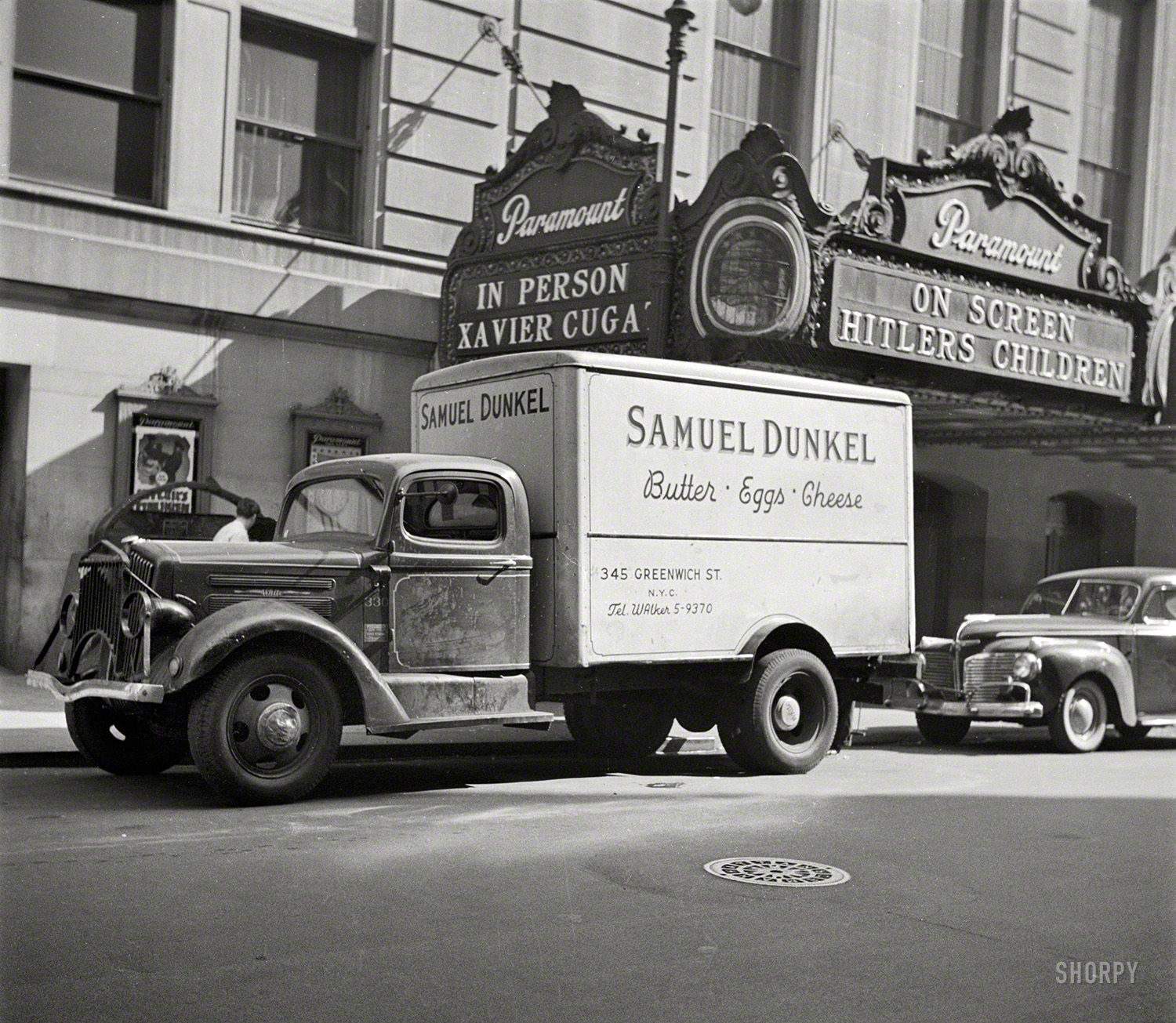 March 1943. "New York. A dairy truck on 44th Street." At the Paramount, a double bill where the distinction between "on screen" and "in person" matters, especially if you're Xavier Cugat. Photo by John Vachon. View full size.