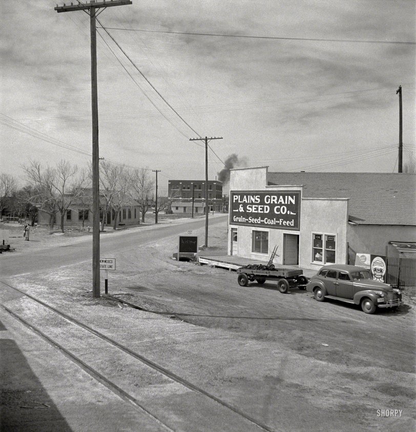 March 1943. "Farwell, Texas, at the New Mexico state line. Going through town on the Atchison, Topeka &amp; Santa Fe Railroad between Amarillo, Texas, and Clovis, New Mexico." Photo by Jack Delano, Office of War Information. View full size.
