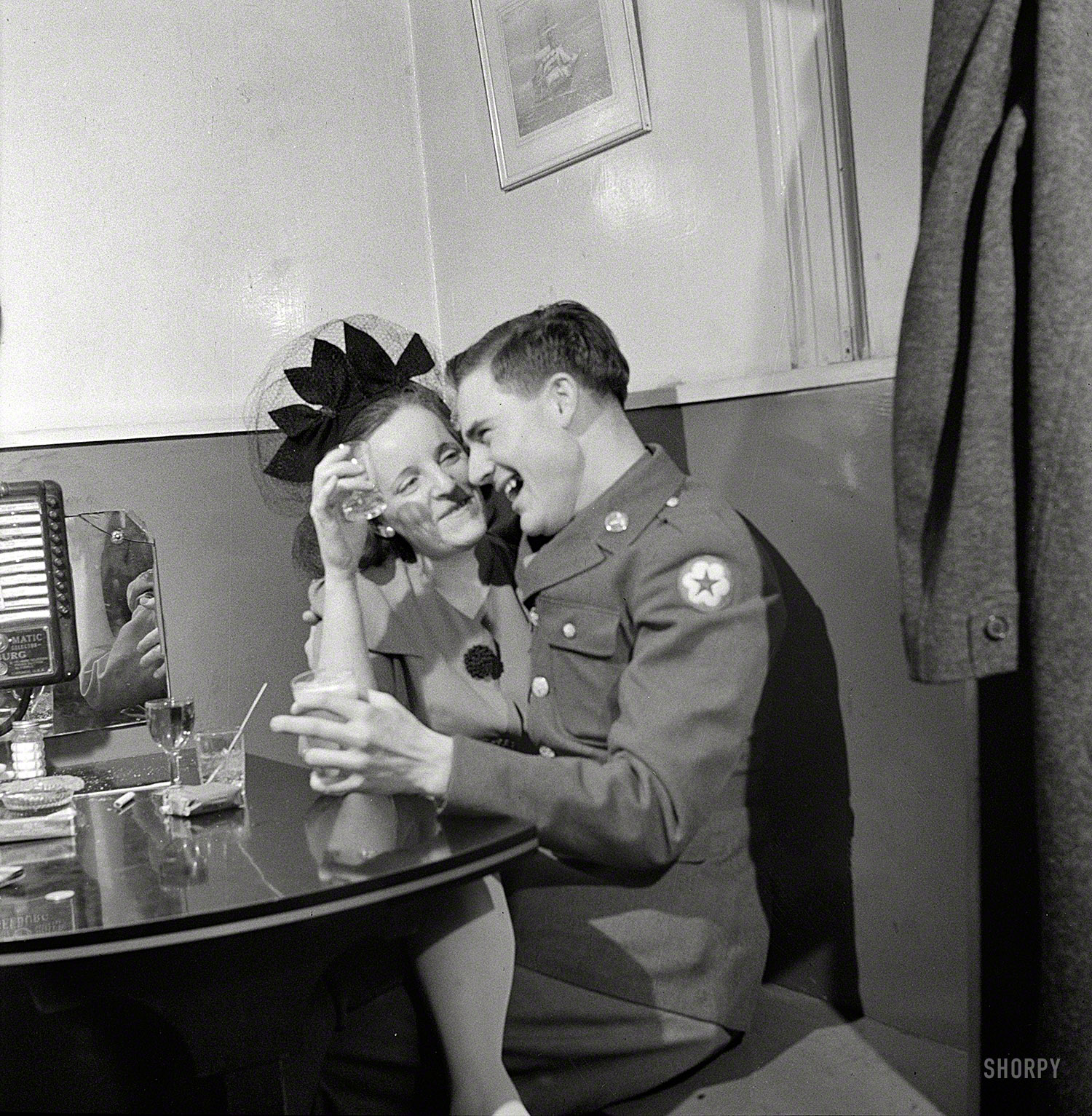 April 1943. Washington, D.C. "Slightly inebriated couple at the Sea Grill." Photo by Esther Bubley for the Office of War Information. View full size.