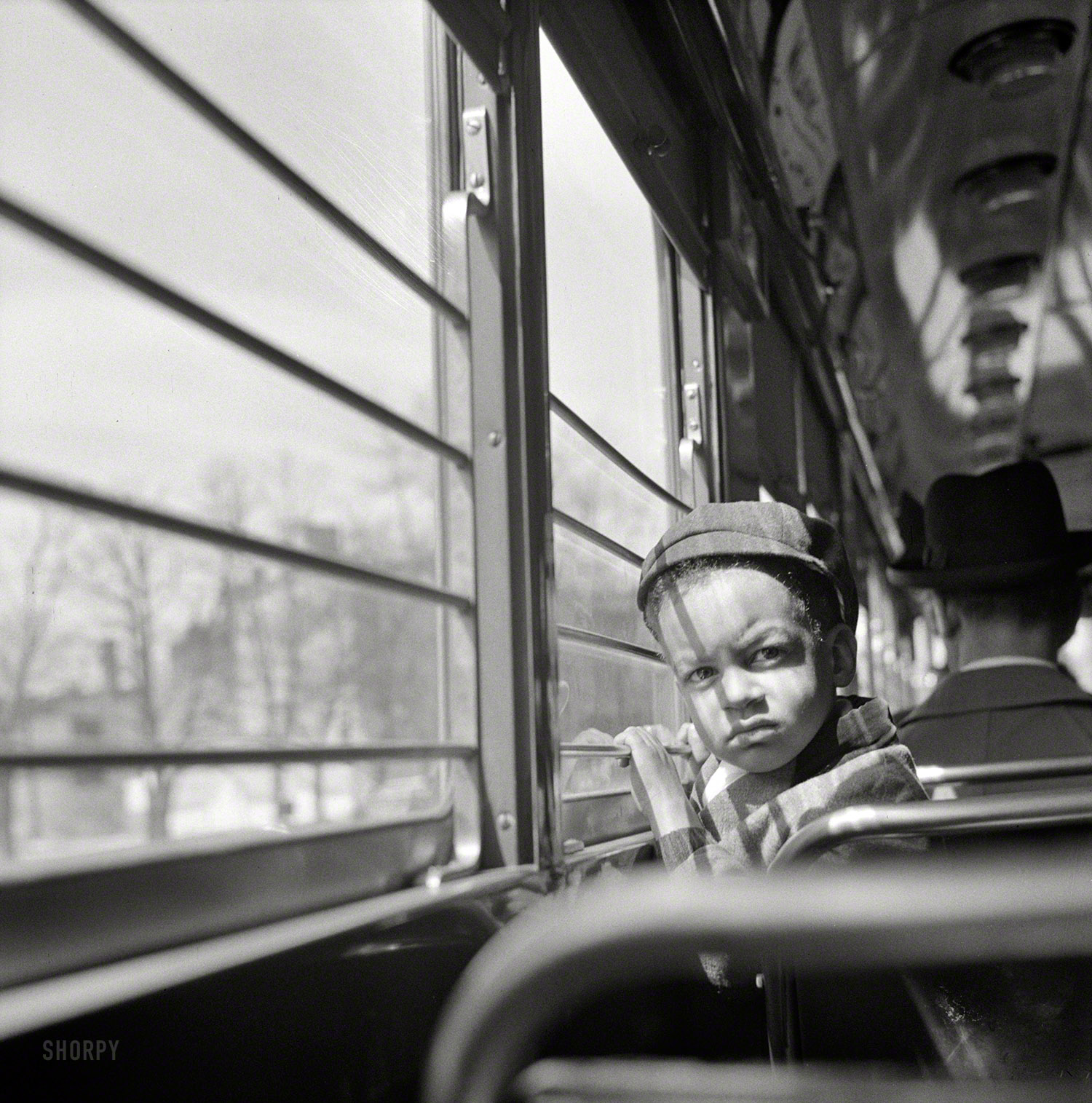 April 1943. Washington, D.C. "Little boy riding on a streetcar." Photo by Esther Bubley for the Office of War Information. View full size.