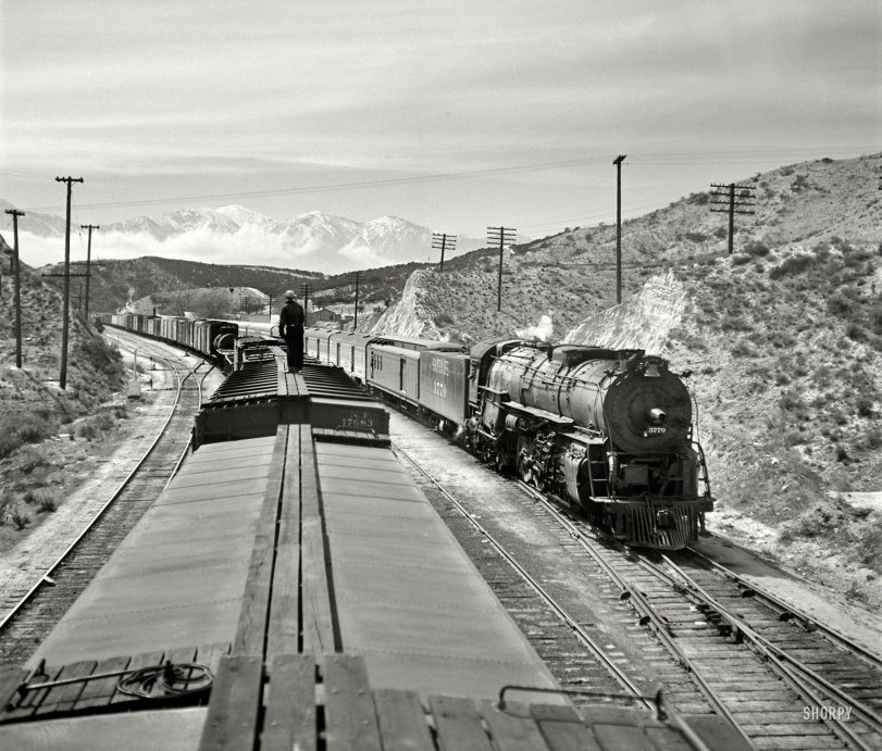 March 1943. "Summit, California (vicinity). Passing an eastbound passenger train, the Chief, while coming down the mountain on the Atchison, Topeka &amp; Santa Fe Railroad between Barstow and San Bernardino." Medium-format negative by Jack Delano for the Office of War Information. View full size.
