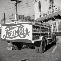 March 1943. "Montgomery, Alabama. Soft drink truck." Pepsi goes to war. Photo by John Vachon for the Office of War Information. View full size.