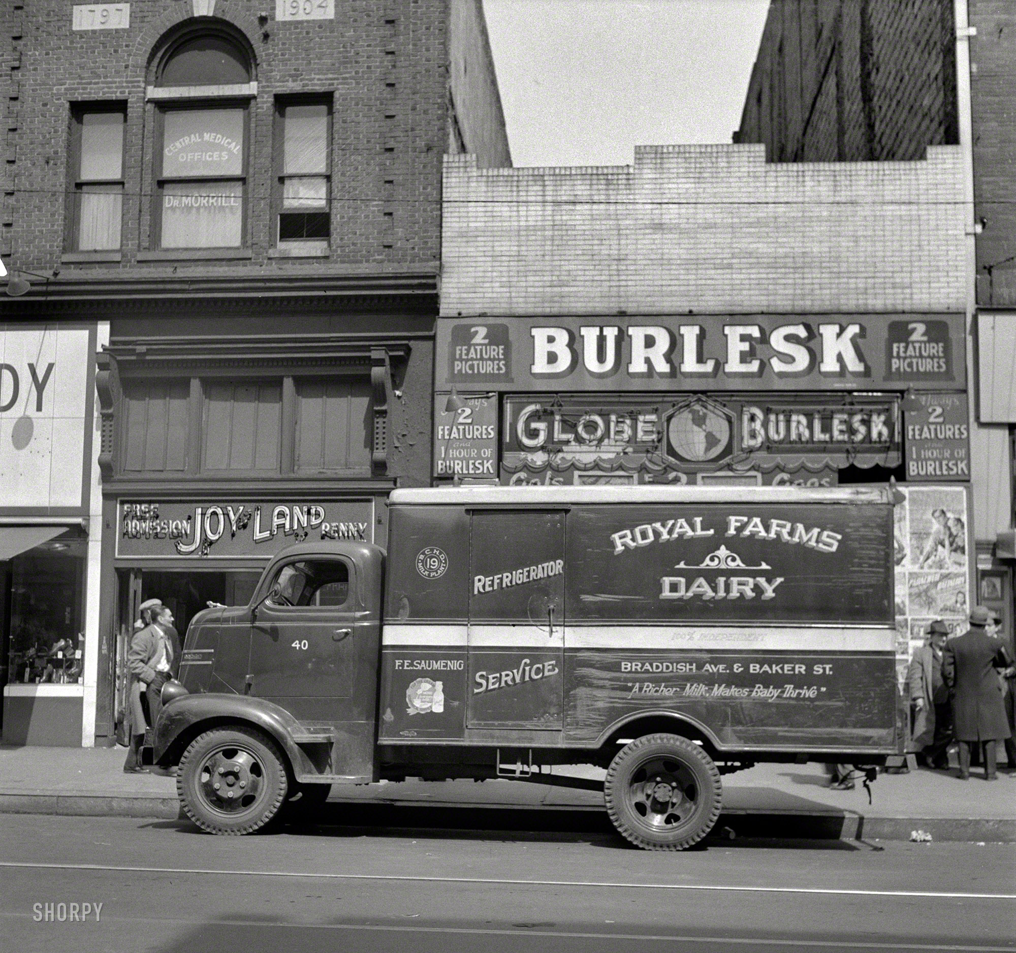 April 1943. "Baltimore, Maryland -- a street scene. Light Street." Photo by Marjory Collins for the Office of War Information. View full size.
