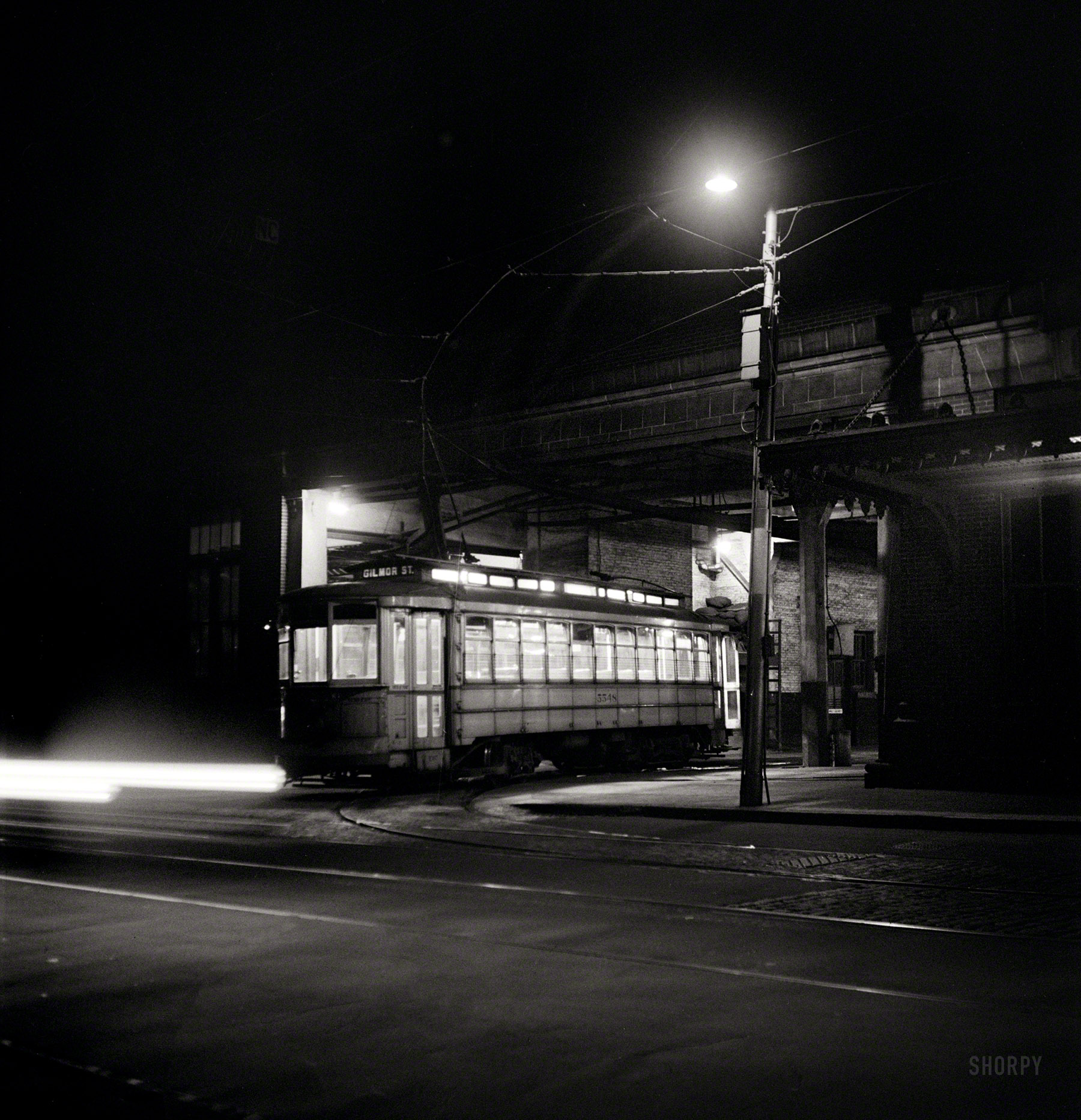April 1943. "Baltimore, Maryland. Trolley leaving the terminal at night." Photo by Marjory Collins for the Office of War Information. View full size.