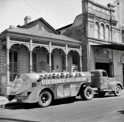 March 1943. "New Orleans oil truck." Note the wings atop the tank. Medium format negative by John Vachon, Office of War Information. View full size.