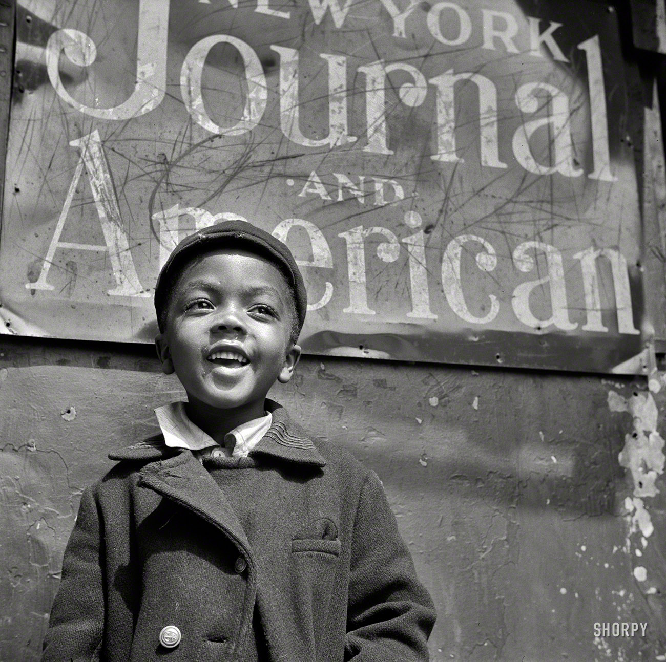 Harlem newsboy. May-June 1943. View full size. Photograph by Gordon Parks.

