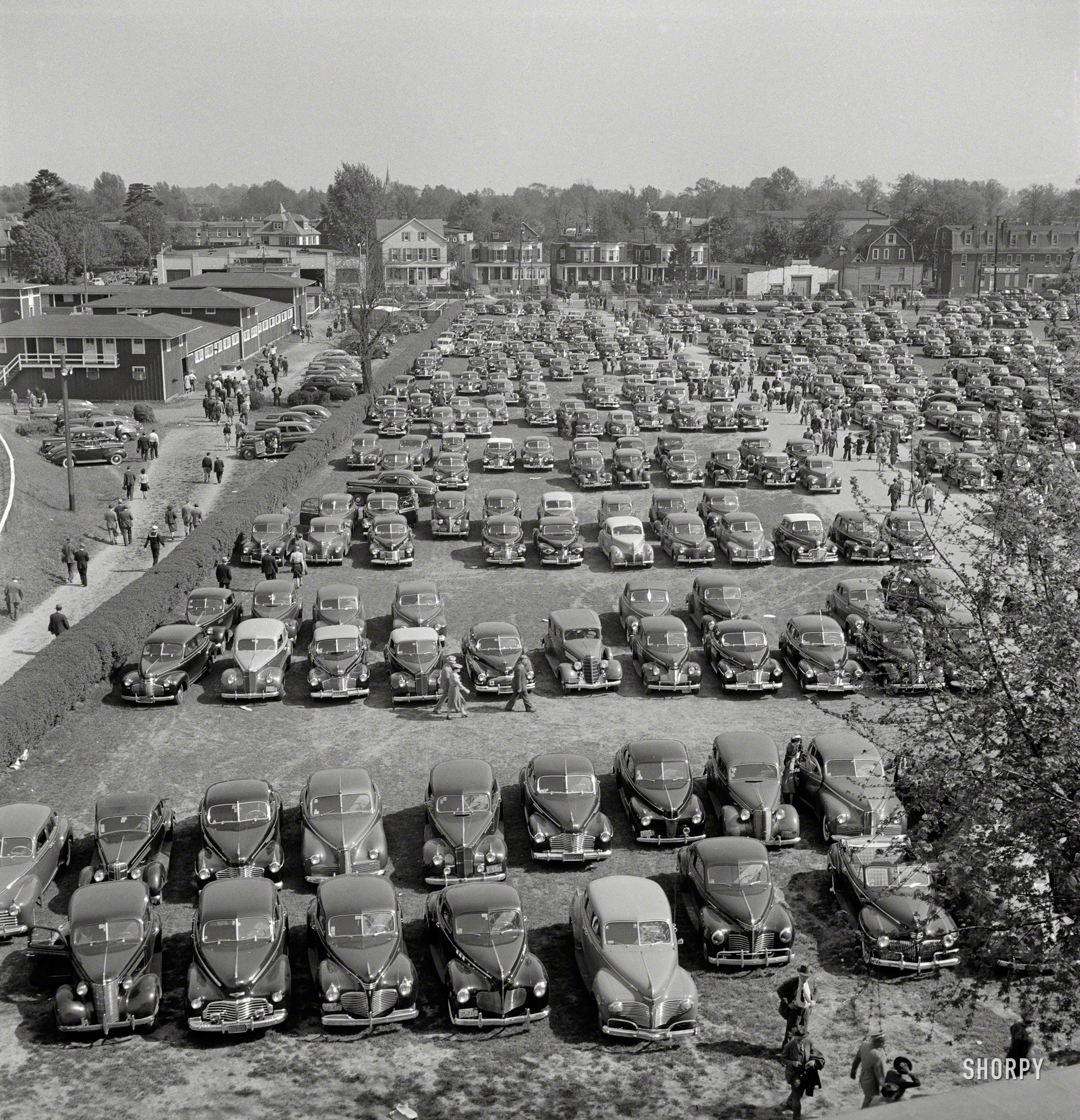 May 1943. "Pimlico racetrack near Baltimore, Maryland. Parked cars in spite of gas ration." Photo by Arthur Siegel, Office of War Information. View full size.