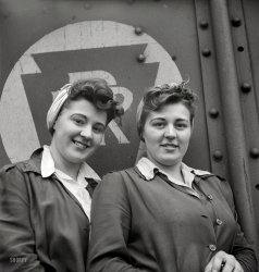 May 1943. Pitcairn, Pennsylvania. "Twins Amy and Mary Rose Lindich, 21, employed at the Pennsylvania Railroad as car repairmen helpers, earning 72 cents per hour. They reside in Jeanette and carpool with fellow workers." Photo by Marjory Collins for the Office of War Information. View full size.