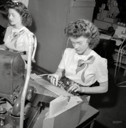 June 1943. "Washington, D.C. Pasting up a telegram at the Western Union telegraph office. Doris and Dorothy Bell send and receive telegrams from the Baltimore circuit." If only Doris had been named Dash. Photo by Esther Bubley for the Office of War Information. View full size.