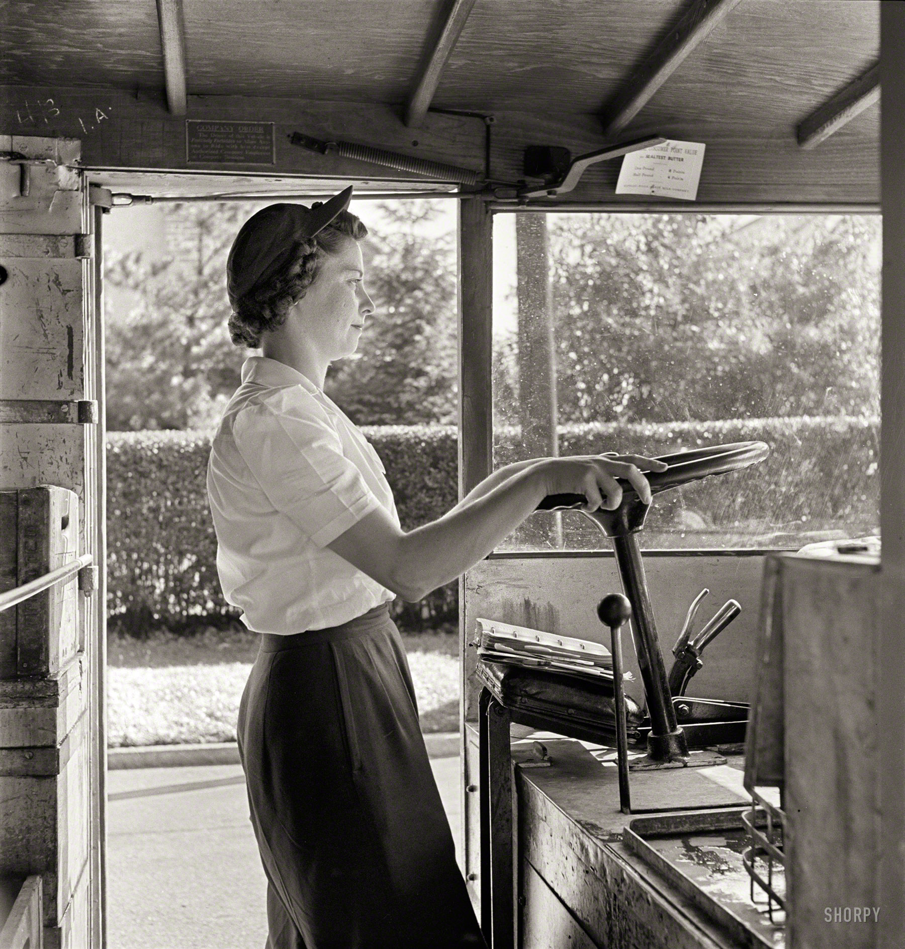 June 1943. Bryn Mawr, Pa. "Mrs. Helen Joyce, one of the many women now working for the Supplee-Wills-Jones Milk Co. She has one child and her husband is a seaman first class in the Navy." Photo by Jack Delano. View full size.