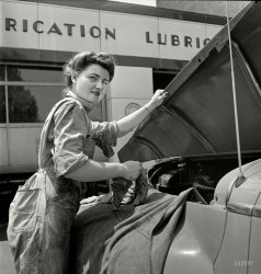 June 1943. "Philadelphia, Pennsylvania. Miss Frances Heisler, a garage attendant at one of the Atlantic Refining Company garages. She was formerly a clerk in the payroll department of Curtis Publishing." Our fourth visit to this gas station. Photo by Jack Delano for the Office of War Information. View full size.