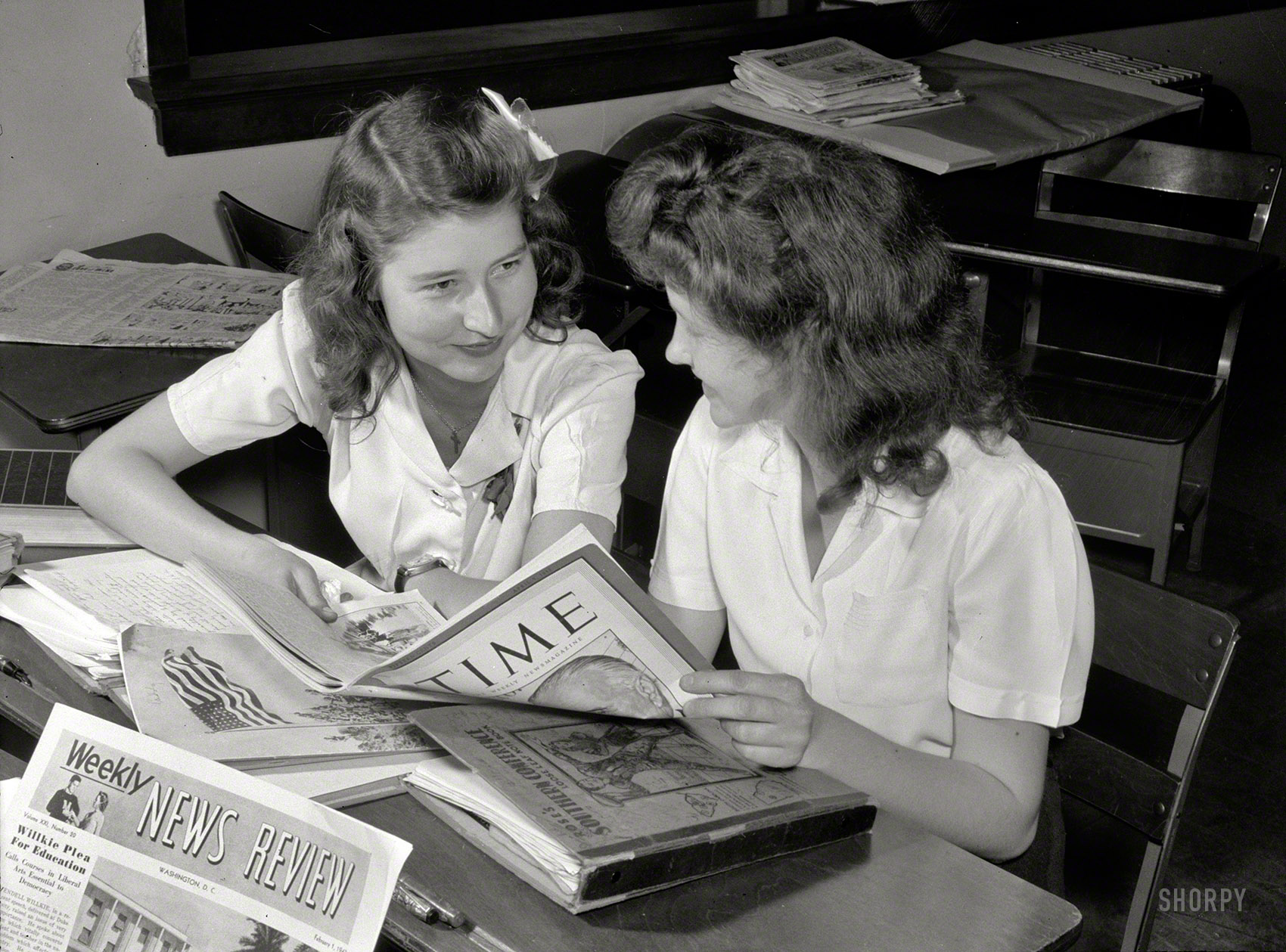 Spring 1943. "Keysville, Virginia. Randolph Henry High School. Social studies class. Students study in groups of six or eight, each group picking own subject." Photo by Philip Bonn for the Office of War Information. View full size.