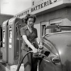 June 1943. Louisville, Kentucky. "Virginia Lively used to be a beauty operator. Today she works at a filling station." Sears gasoline -- who knew? Photo by Howard Hollem for the Office of War Information. View full size.