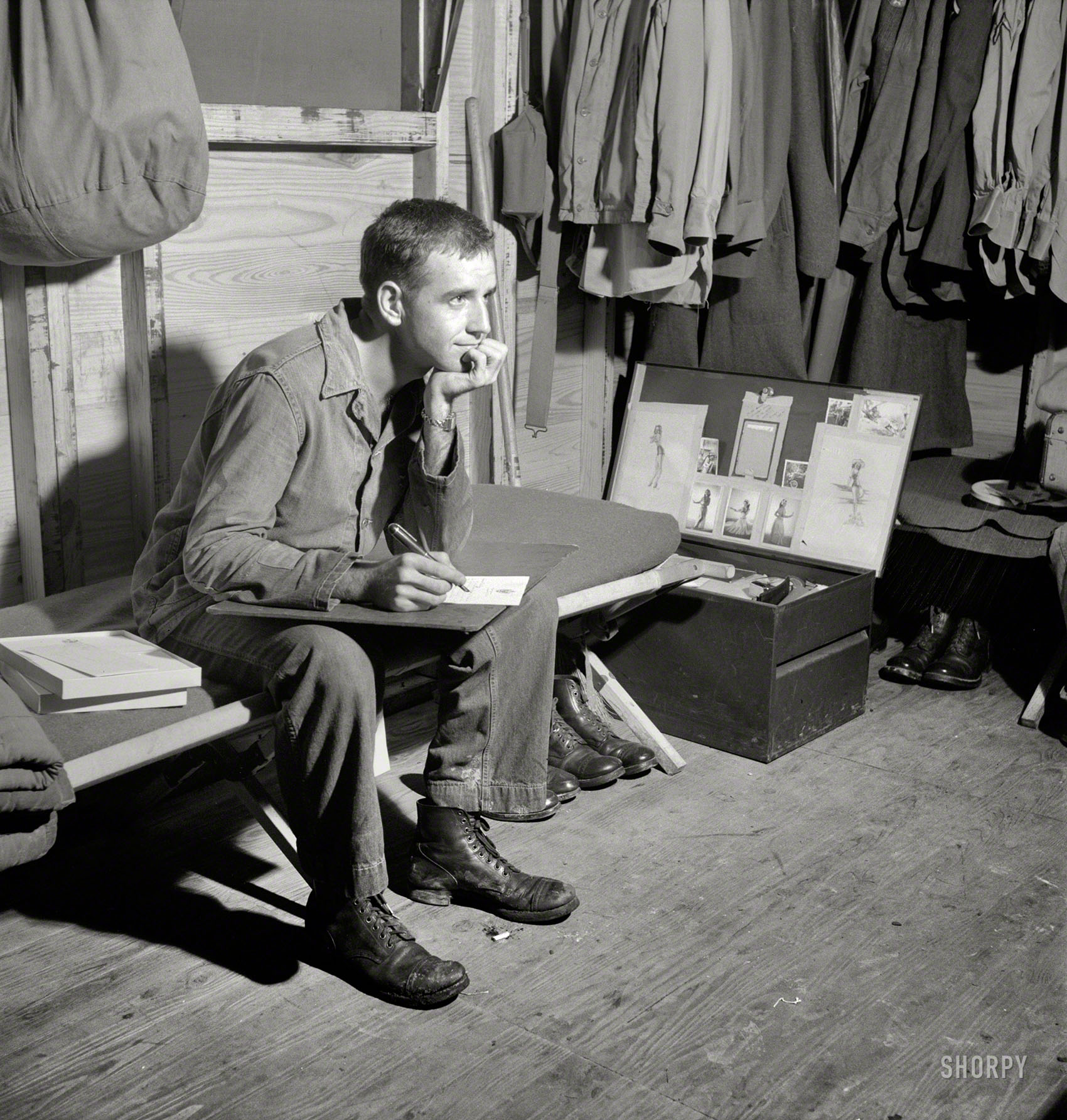 July 1943. "Greenville, South Carolina. Air Service Command. Writing a letter home." Photo by Jack Delano for the Office of War Information. View full size.