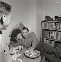 October 1943. Washington, D.C. "Servicemen and girl at a party." Our title comes from the bookshelf, although it could be from the girl. Strategically, her companion has the right idea: Get your lady comfortable with food and drink, and maybe a pillow. Add conversation and stir. Operationally, though, we'd say the execution needs work. Photo by Esther Bubley, Office of War Information. View full size.