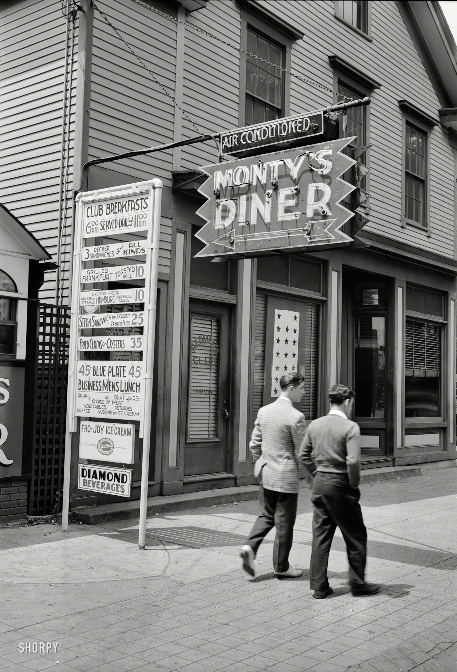 May 1942. "Southington, Connecticut. Monty's Diner." Next door to the Wigwam and Redmen's Club. Photo by Fenno Jacobs for the OWI. View full size.