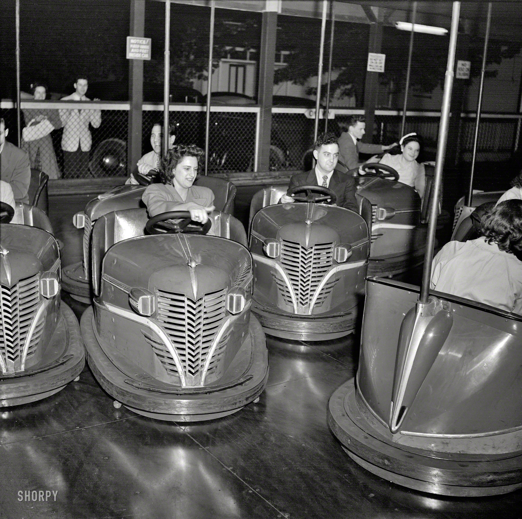 May 1942. "Southington, Connecticut. Amusement park." With a dress code. Photo by Fenno Jacobs for the Office of War Information. View full size.