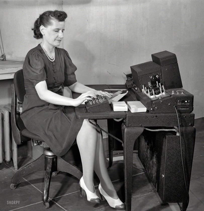 June 1942. Washington, D.C. "U.S. Office of Defense Transportation system of port control and its traffic channel control." More antique IBM punch-card equipment. Photo by Albert Freeman for the Office of War Information. View full size.
