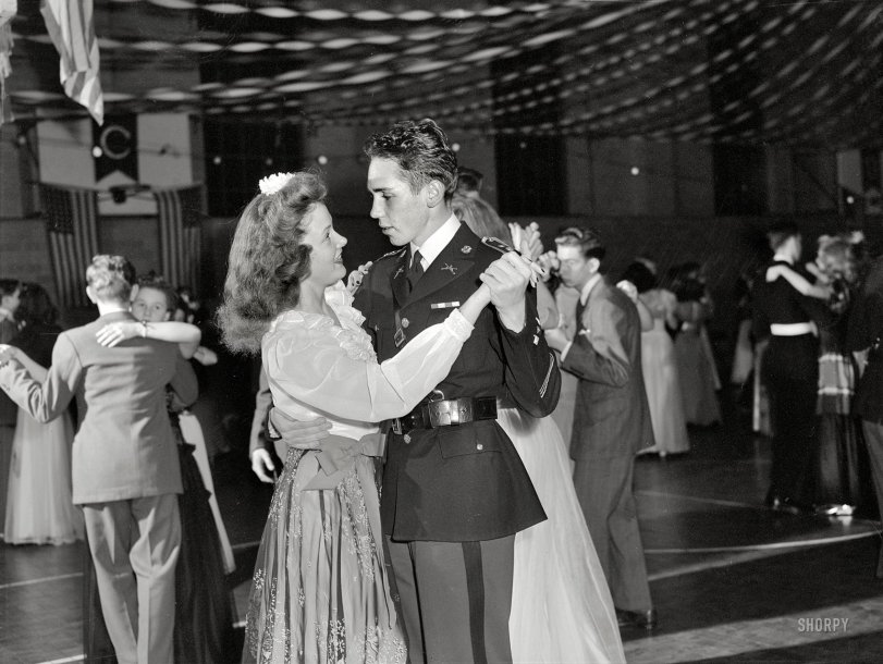 October 1943. Washington, D.C. "Walter Spangenberg, captain in the Woodrow Wilson High School Cadet Corps, at the school's Regimental Ball." Medium-format negative by Esther Bubley, Office of War Information. View full size.