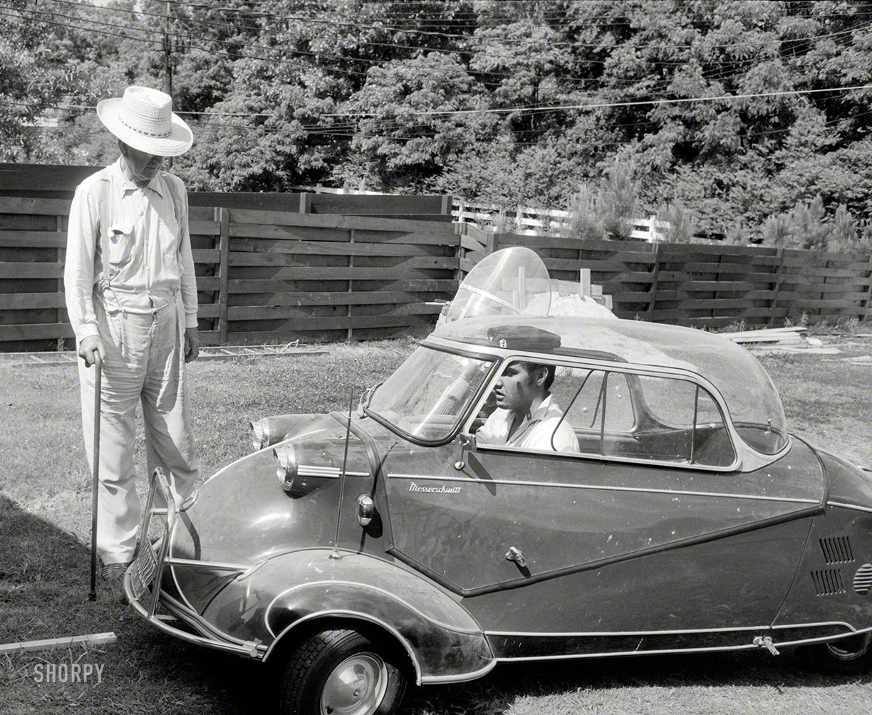 Elvis Presley in 1956 at home in Memphis with his three-wheeled Messerschmitt "bubble car" and Harley-Davidson motorcycle, and grandfather Jessie Presley. Photo by Phillip Harrington for Look magazine. View full size.