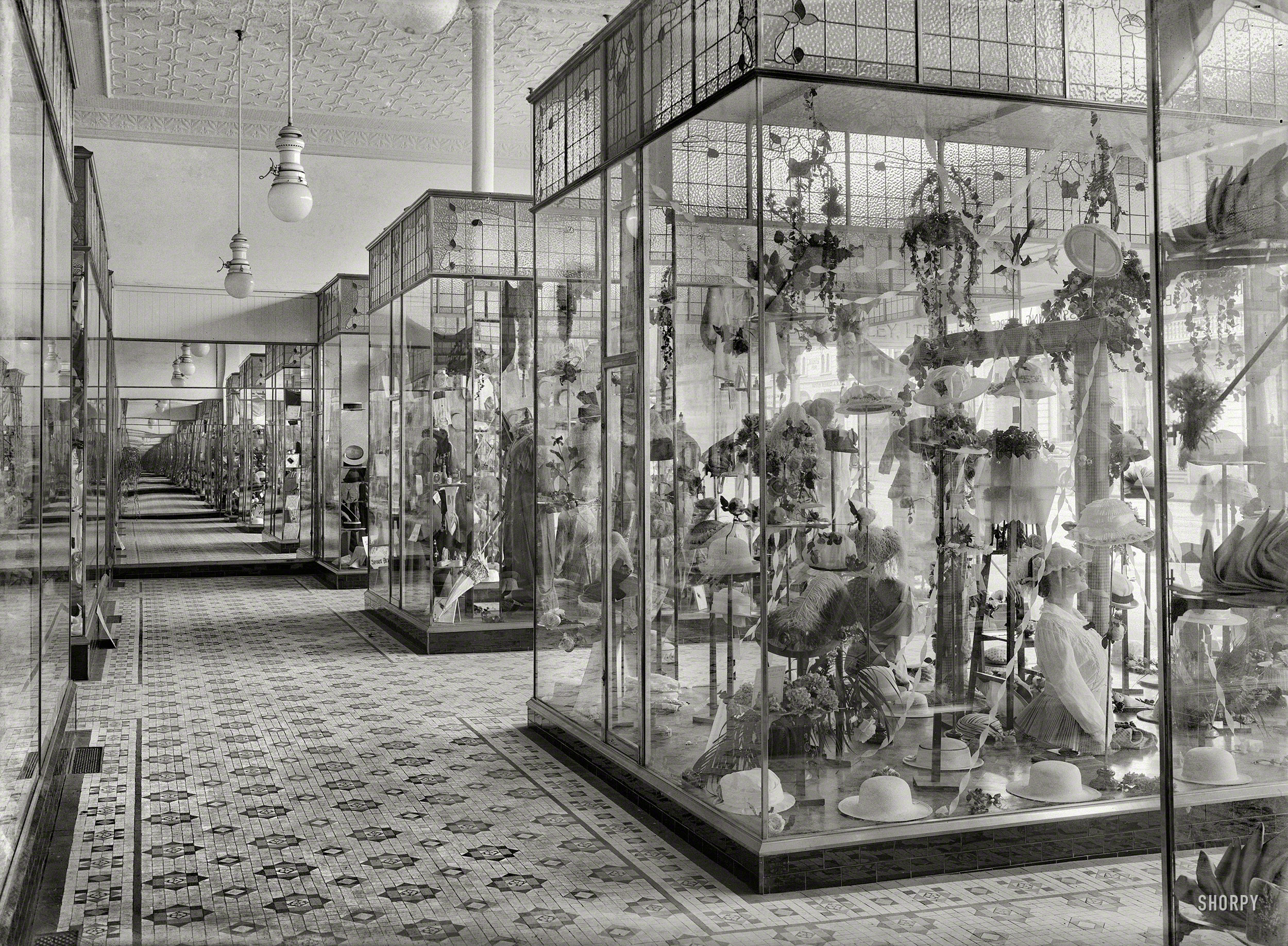 New Zealand, 1915. "Display cases in the Economic drapery store, Wanganui." Tesla Studios glass negative by Frank J. Denton. View full size.