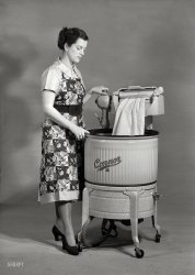 "Connor washing machine with motorized wringer." Circa 1950 photo by the Gordon Burt studio in Wellington, New Zealand. View full size.