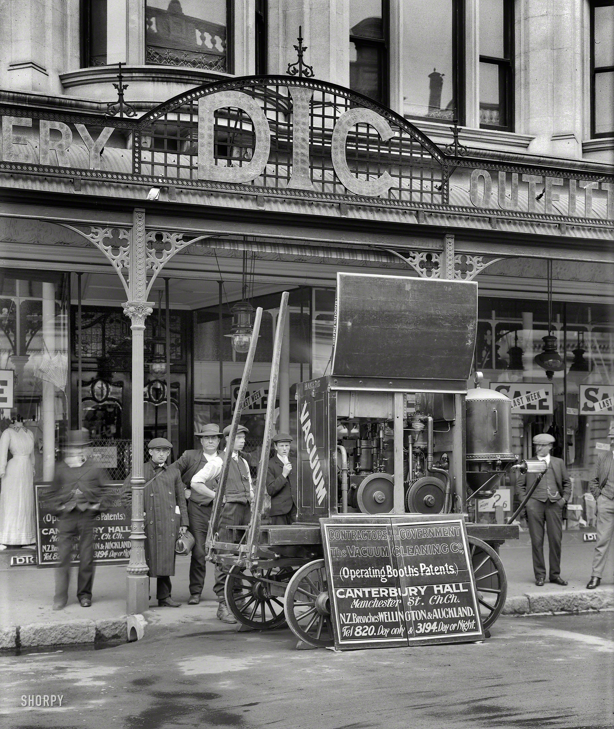 Christchurch, New Zealand, circa 1910. "Vacuum Cleaning Company machine at DIC store." Steffano Webb Photographic Studio glass negative. View full size.