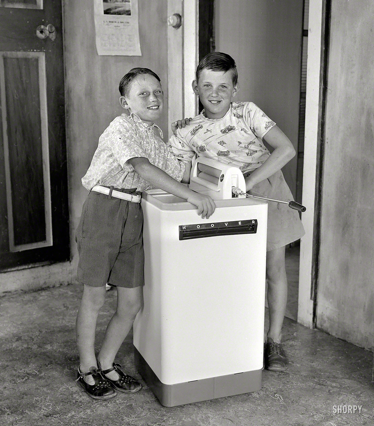 Jan. 19, 1956. Wellington, New Zealand. "Anthony and Paul Banks with a Hoover washing machine." The pint-size washer for small families. View full size.