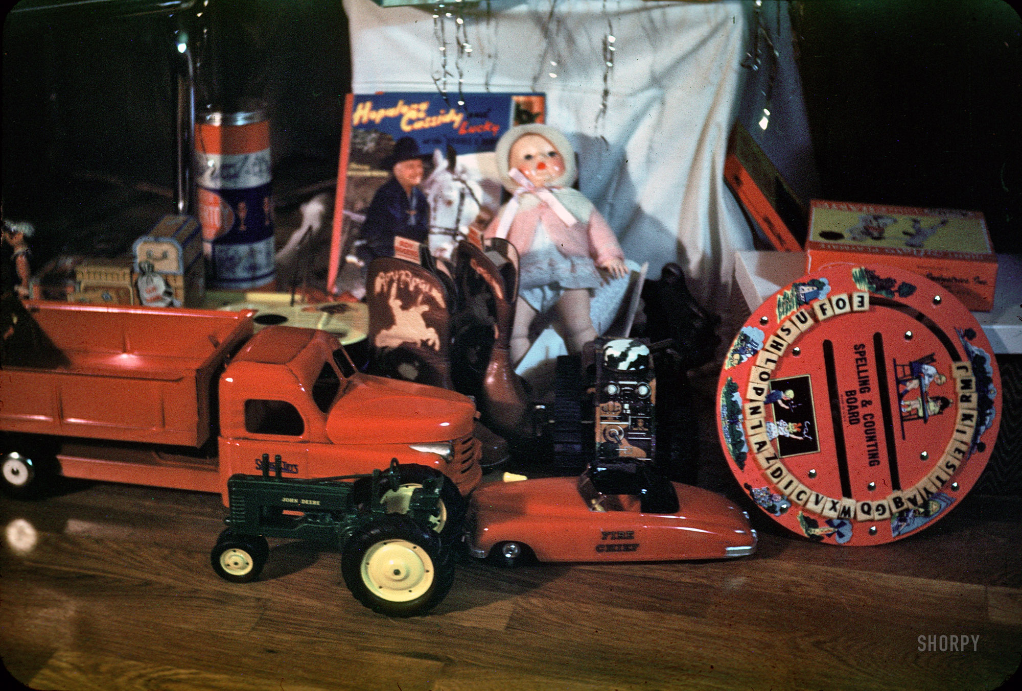 "Xmas 1950." 35mm Kodachrome yanked at random out of a box of slides bought on eBay. I call dibs on the dump truck. View full size.