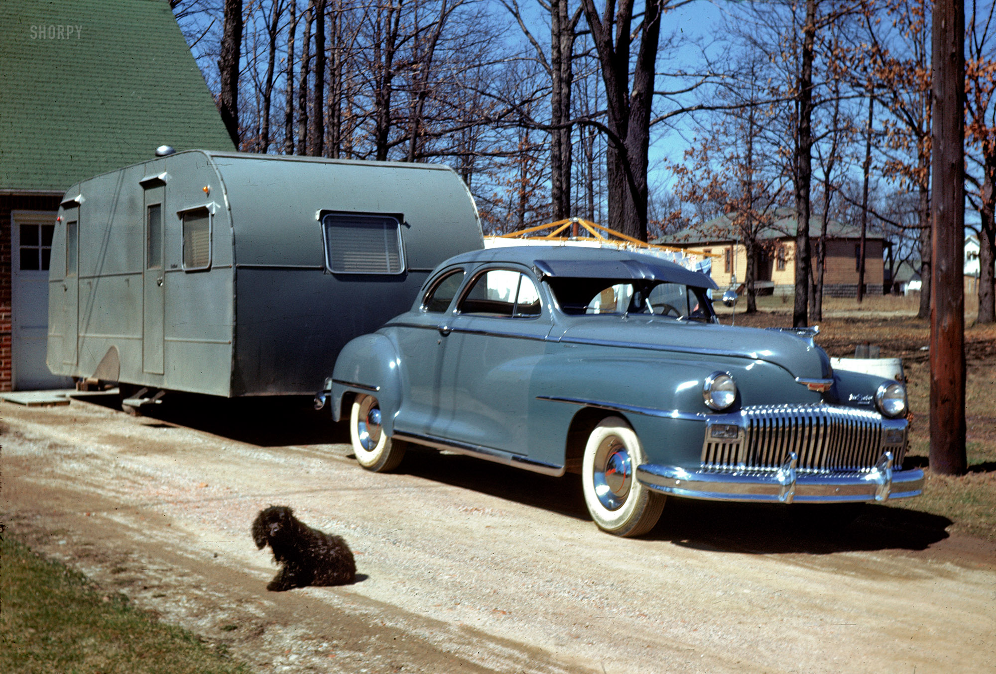 "1949." From the same batch of slides as 1951's Family Vacation comes this Kodachrome of a similar trailer. Click here for a side view. View full size.
