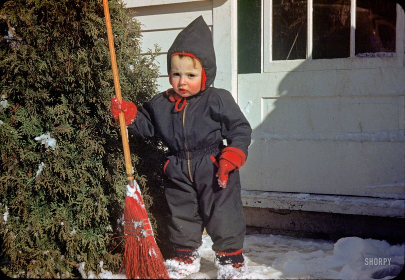 Snowy New England circa 1949, and young Linda is doing her part to help dig out after the storm. But a girl can do only so much shoveling with a broom. Where's Mommy with that hot chocolate? 35mm Kodachrome slide. View full size.
