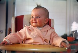 From around 1948 comes this candid Kodachrome of young Linda on her throne, sporting a new 'do. 35mm color slide found on eBay. View full size.