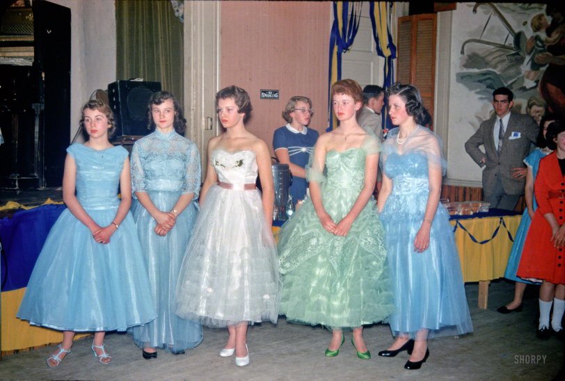 This circa 1956 Kodachrome of five pastel princesses has no label, so you'll have to pencil one in yourself. ("How long does it take a boy to come back with a cup of punch"?) In the meantime, maybe there's someone out there who'll recognize the room, or an old flame. Scanned from the "Linda" slides. View full size.
