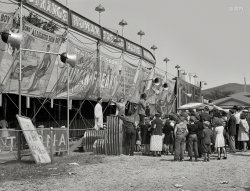 September 1941. "Freak Show at the State Fair in Rutland, Vermont." Next up: Boko the "Alligator Skin Boy." Photo by Jack Delano. View full size.