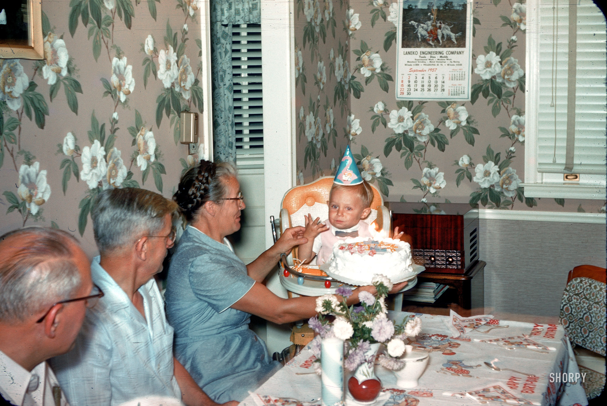 September 1957 somewhere in Pennsylvania. In the prequel to this slide, we have Big Brother's second birthday. Let the anthropological analysis and cultural deconstruction begin! 35mm Kodachrome transparency. View full size.