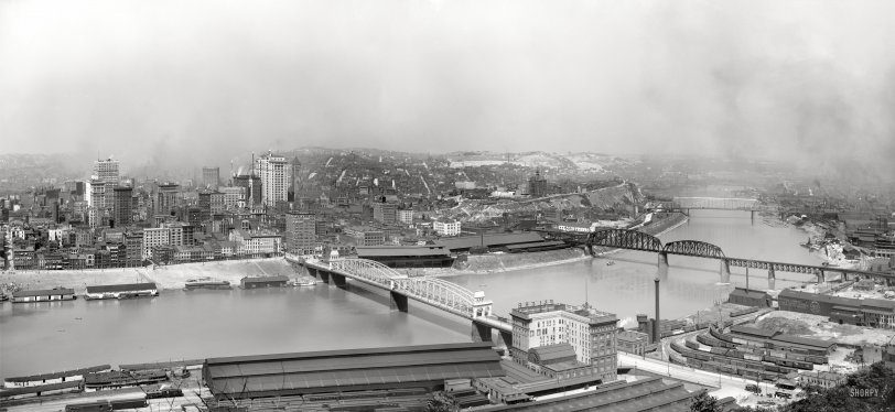 Circa 1905. "Pittsburgh from Mount Washington -- Monongahela River with Smithfield Street Bridge and Pan Handle Bridge." Panorama made from two 8x10 inch dry plate glass negatives. Detroit Publishing Company. View full size.
