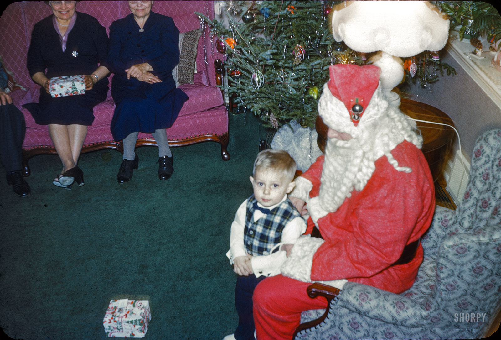Pennsylvania circa 1958. Santa makes a house call! So, what do you want, Sonny? Come sit on Santa's lap and tell him all about it. View full size.