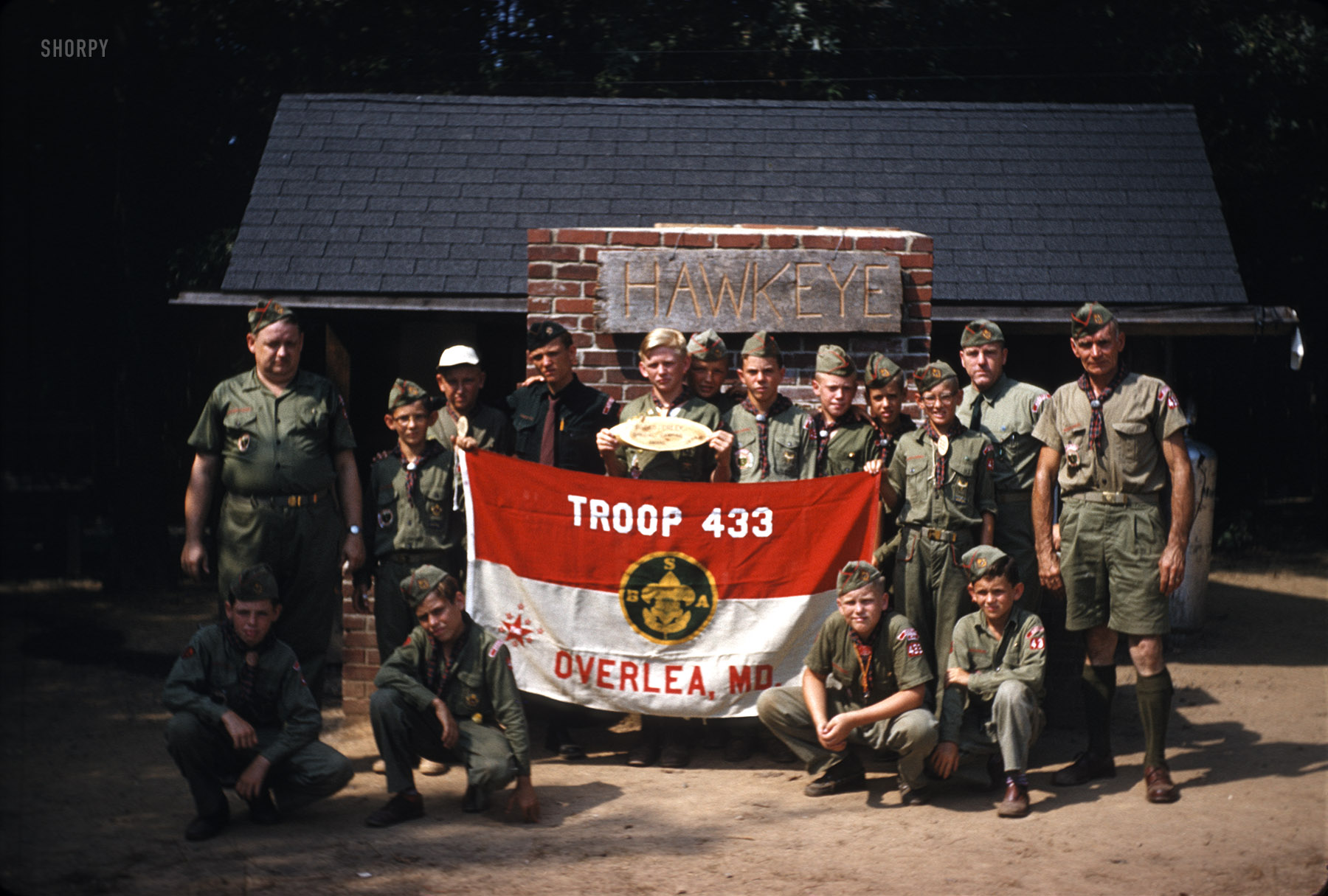 "Boy Scouts 1956." Our young friend Kermy is holding the flag on the right in this Kodachrome slide found on eBay. View full size.