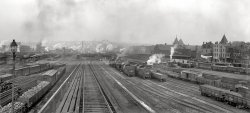 Scranton, Pennsylvania, circa 1900. "Delaware, Lackawanna, and Western Railroad yards." Panorama of two 8x10 inch glass negatives. We've seen the left half of this view before; the right side, with someone's laundry billowing bravely amid the the soot, is new. Detroit Publishing Company. View full size.