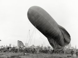 October 27, 1917. "Western Front (Belgium), Ypres Area -- an observation balloon about to ascend." Glass negative by James Francis Hurley. View full size.