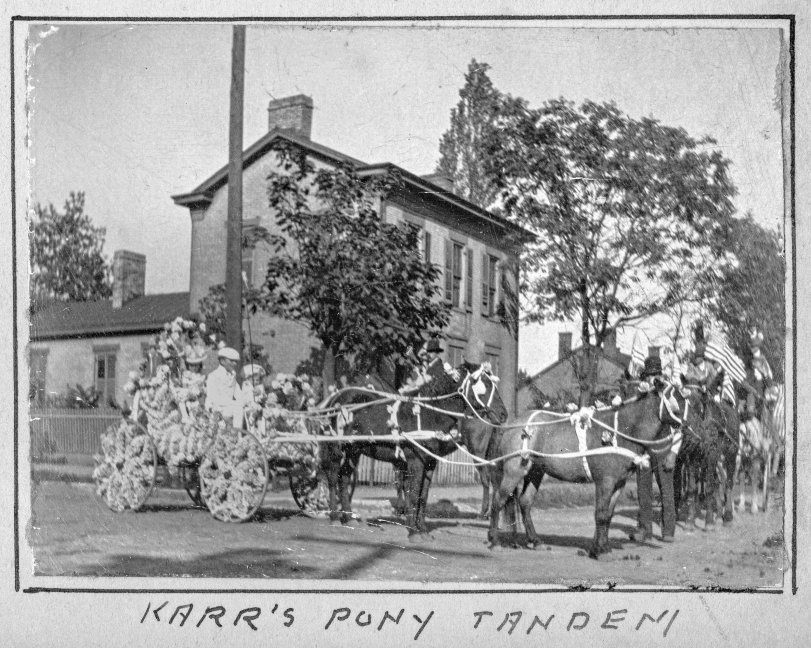 Karr's Pony Tandem, Flower Parade Float at the Belleville, Illinois, town fair, 1901. Karr Supply Company was at West Main Street in Belleville and were engineers and contractors, manufacturers of hot water and steam healing apparatus, plumbers and dealers In fixtures and electric chandeliers.
Photo taken by Samuel Peake Hyde, b. Feb 17, 1850, St. Francisville, Clark, Missouri; d. April 28, 1921, Belleville, St. Clair, Illinois., son of Edwin C. Hyde and Elizabeth Hyde. Samuel was a clerk for J. G. Green Company, 1867, and then worked with his father at E.C. Hyde &amp; Co., Storage and Commission, 4 South Commercial Street, Belleville, IL. Sam resided at 37 North Douglas, Belleville.
