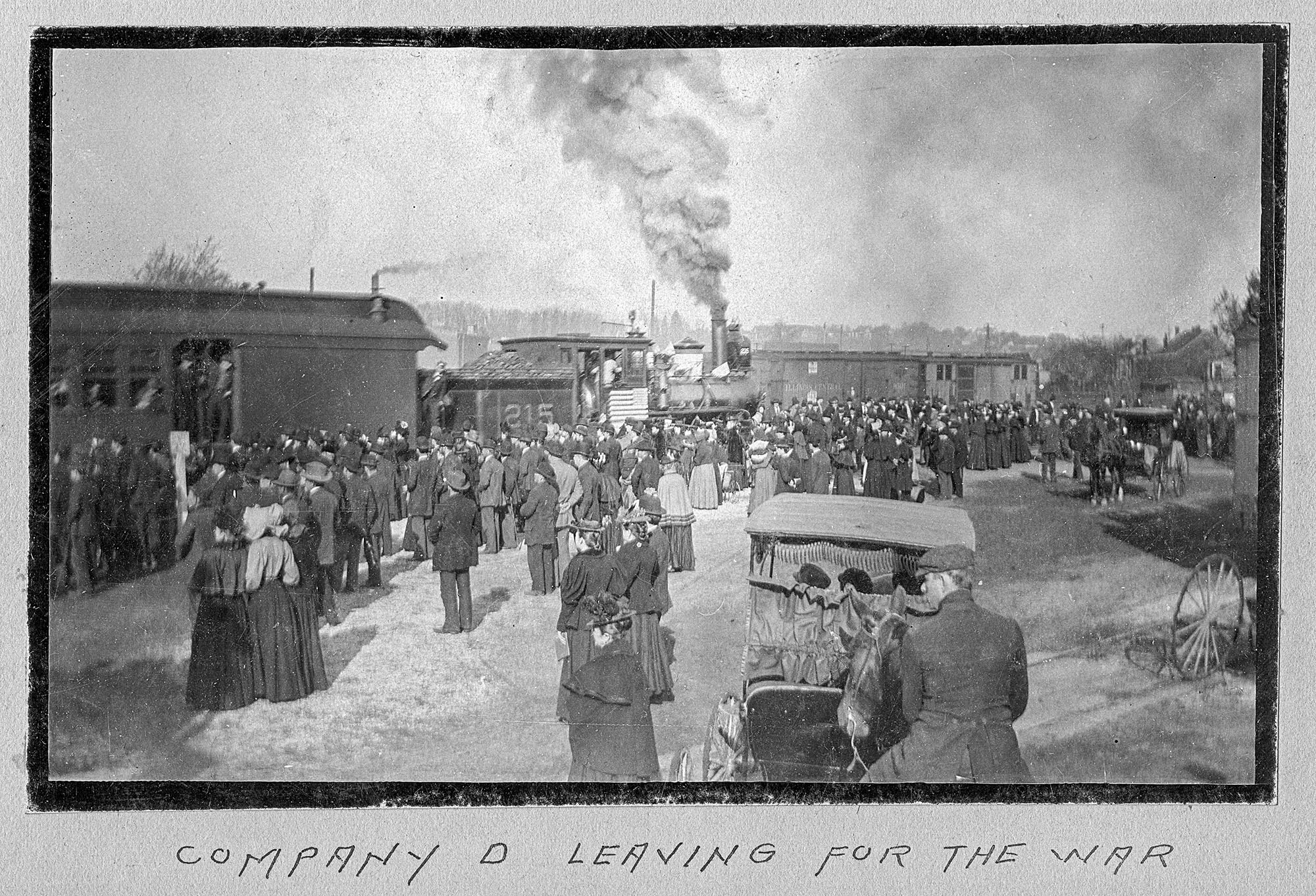 Company D of the 2nd Missouri Volunteer Infantry leaving for the Spanish-American War. Sedalia, Missouri, 1898. 

On April 25, 1898 the United States declared war on Spain following the sinking of the Battleship Maine in Havana harbor on February 15, 1898. The war ended with the signing of the Treaty of Paris on December 10, 1898. As a result Spain lost its control over the remains of its overseas empire -- Cuba, Puerto Rico, the Philippines Islands, Guam, and other islands. The war had cost the United States $250 million and 3,000 lives, of whom, 90% perished from infectious diseases.

Photo taken by Samuel Peake Hyde, b. Feb 17, 1850, St. Francisville, Clark, Missouri; d. April 28, 1921, Belleville, St. Clair, Illinois., son of Edwin C. Hyde and Elizabeth Hyde. Samuel was a clerk for J. G. Green Company, 1867, and then worked with his father at E.C. Hyde & Co., Storage and Commission, 4 South Commercial Street, Belleville, IL. Sam resided at 37 North Douglas, Belleville, Illinois.
