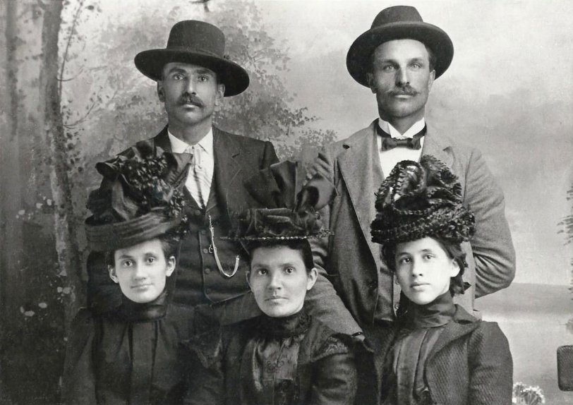 Studio portrait of my grandfather, William Haase, taken about 1910 in Deadwood,  South Dakota. He is at left rear, with an unidentified friend to his left.  The three ladies in front are also unidentified, although family legend has it that two of them were "cousins" of Grandpa William. Uh-huh. William died in 1930 when my mother was only 8 years old, so most of the truth about this escapade has been left to conjecture. View full size.
