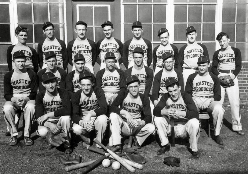 Cleveland, Ohio, 1942. The Master Products Company baseball team taken outside the factory. View full size.

