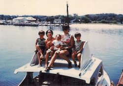 My four sisters and me on our family boat (1967). The boat was kept in a marina in Queens and we would spend our weekends and summers boating around Long Island. A favorite trip was to the Hamptons. Sounds fancy but, believe me, it wasn't. Not with six females on board. My father named the boat "Cuidado".  A shout-out my mother frequently used while a passenger in a car or boat, meaning "watch out" in Spanish. On the side of the boat my father, an artist, painted a baby bird hatching out of an egg with the beak wide open and the word "Cuidado" boldly painted.  He had a wonderful sense of humor. So did my mother. Thank God. View full size.
(ShorpyBlog, Member Gallery)