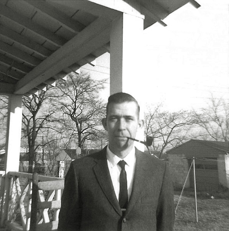 c. 1963 - Birmingham, Alabama. My dad and his classic "pipe in the mouth" pose, outside our home in North Birmingham.
If I could just see him light up that pipe one more time...
